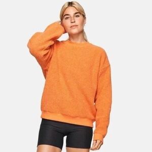 Outdoor Voices Megafleece Crewneck in Papaya